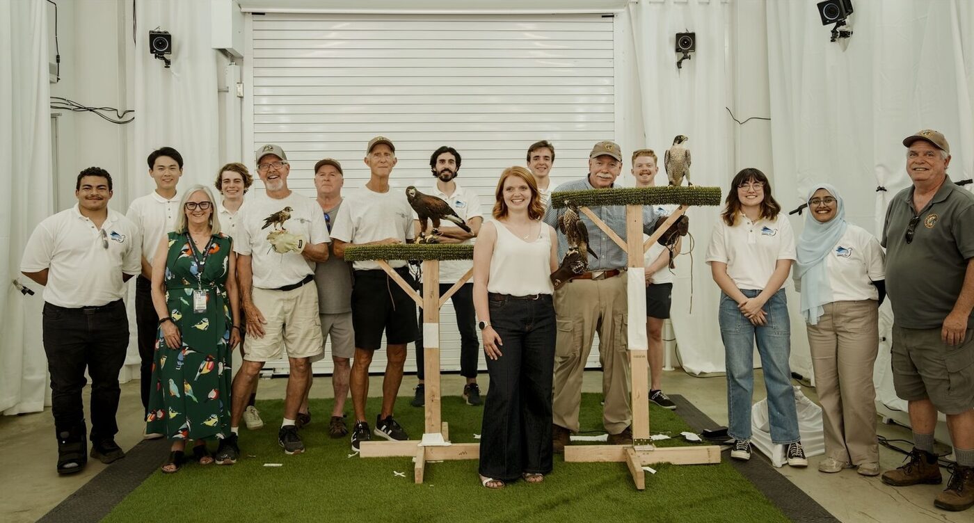 The BIRD Lab team with live raptors in the CALI flight hall